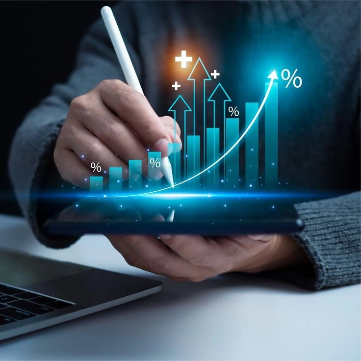 A professional analyzing a glowing blue digital growth chart and percentage icons on a tablet, illustrating the measurable value and ROI of digital marketing for modern businesses.